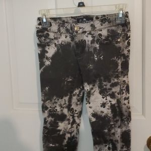 Black and white acid wash skull jeans